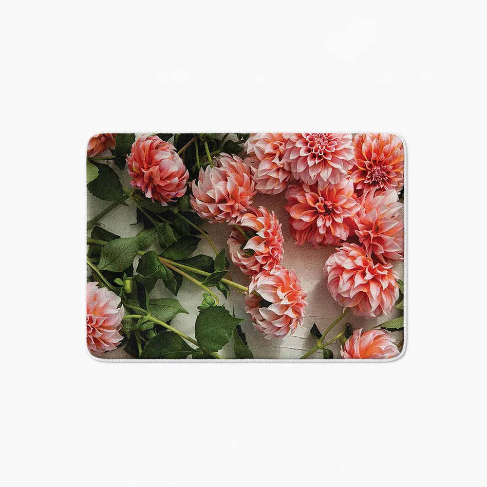 Floral orange scattered dahlias with leaves bathmat