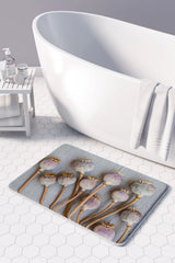 Natural Purple Giant Poppy Seeds on Grey Bathmat